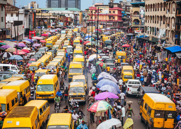 Traffic overview in  Lagos Nigeria market, Lagos Nigeria yellow buses, slangs in Nigeria, Babelos